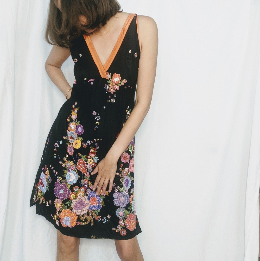 Black knee length floral beaded dress.